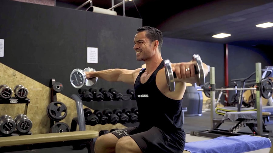 Sports coach Julien Quaglierini performs a shoulder exercise using the Centurion method.